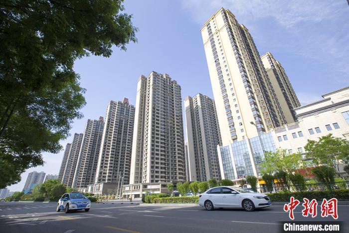 資料圖：車輛從一樓盤前經(jīng)過。 <a target='_blank' href='/'><p  align=